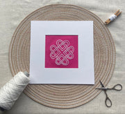 Celtic Knot embroidery design on pink Irish linen