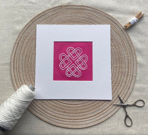Celtic Knot embroidery design on pink Irish linen