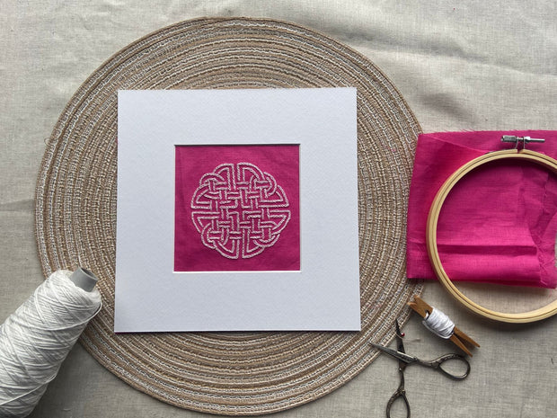 Celtic design on pink Irish linen